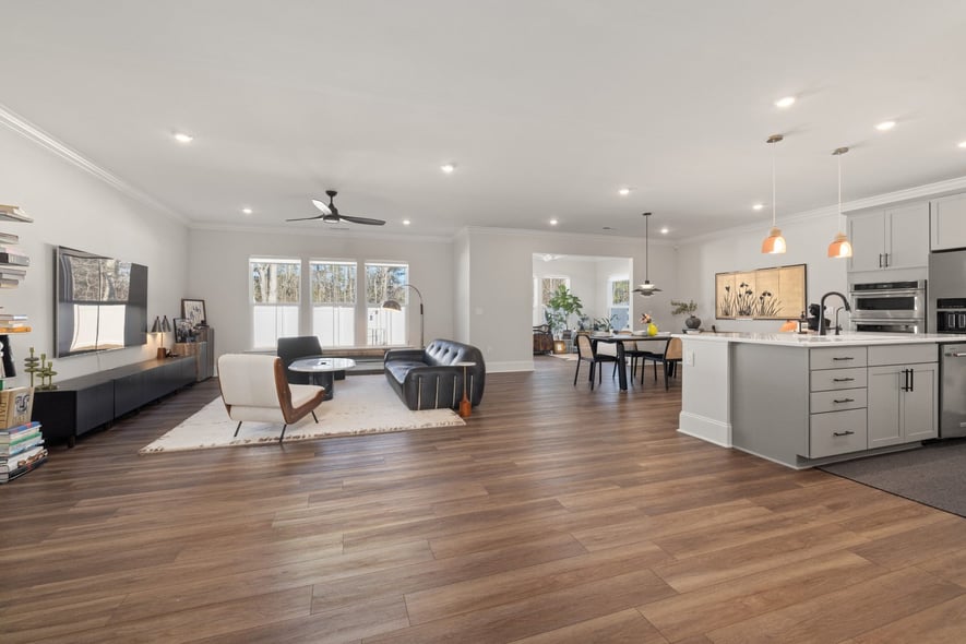 Stock image Open-concept living room and kitchen with wood flooring and modern finishes in Northern California - optimized