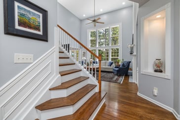 A remodeled set of stairs and sitting room.